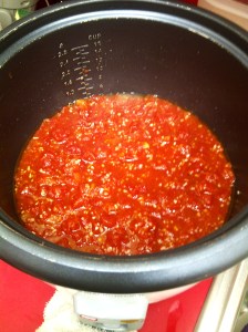 Diced tomatoes and minced garlic in Rice Cooker